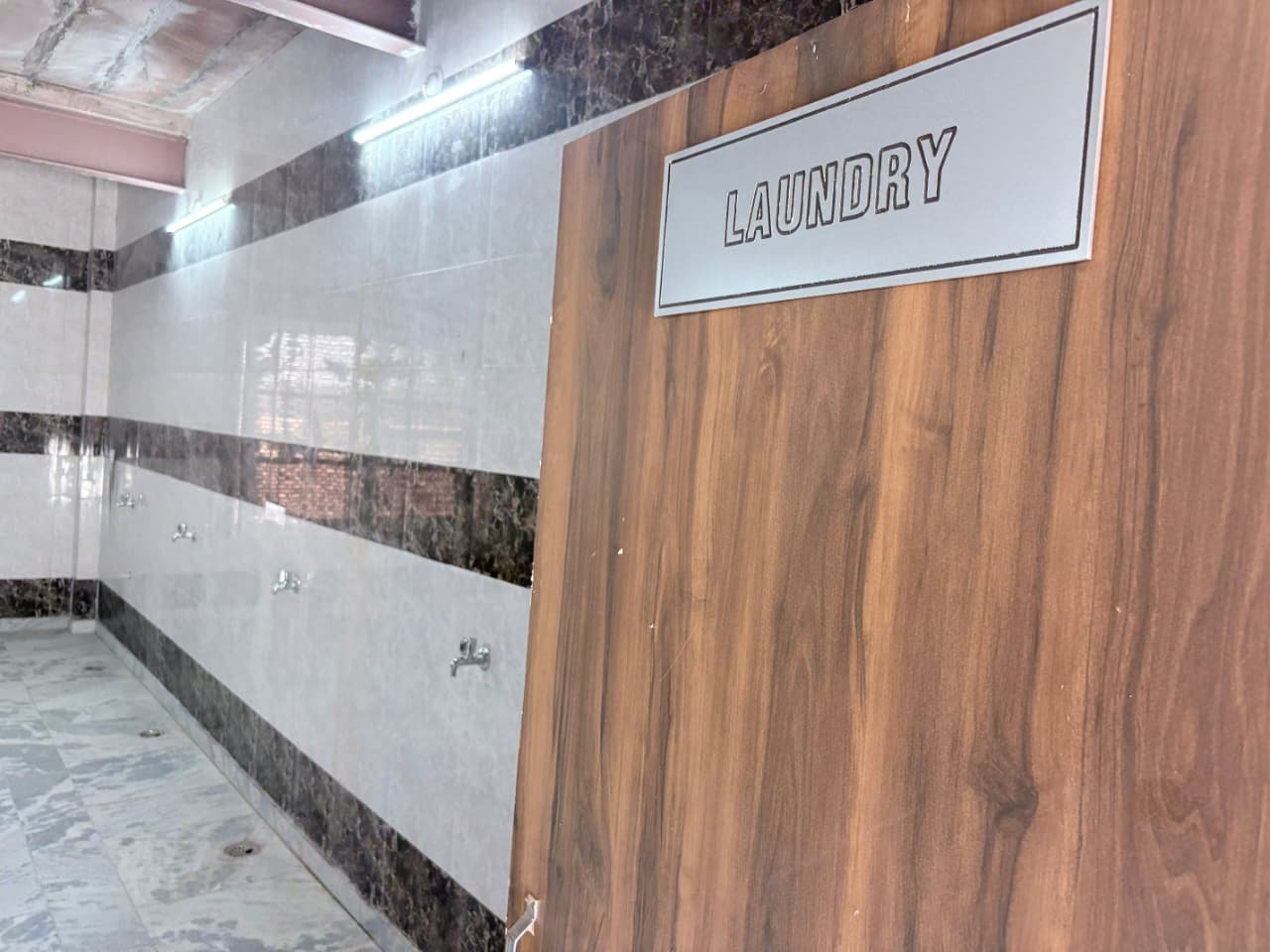 Washing machine & laundry Facility
